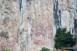 Наскальная живопись в горах Хуашань в Гуанси стала объектом Всемирного наследия ЮНЕСКО
